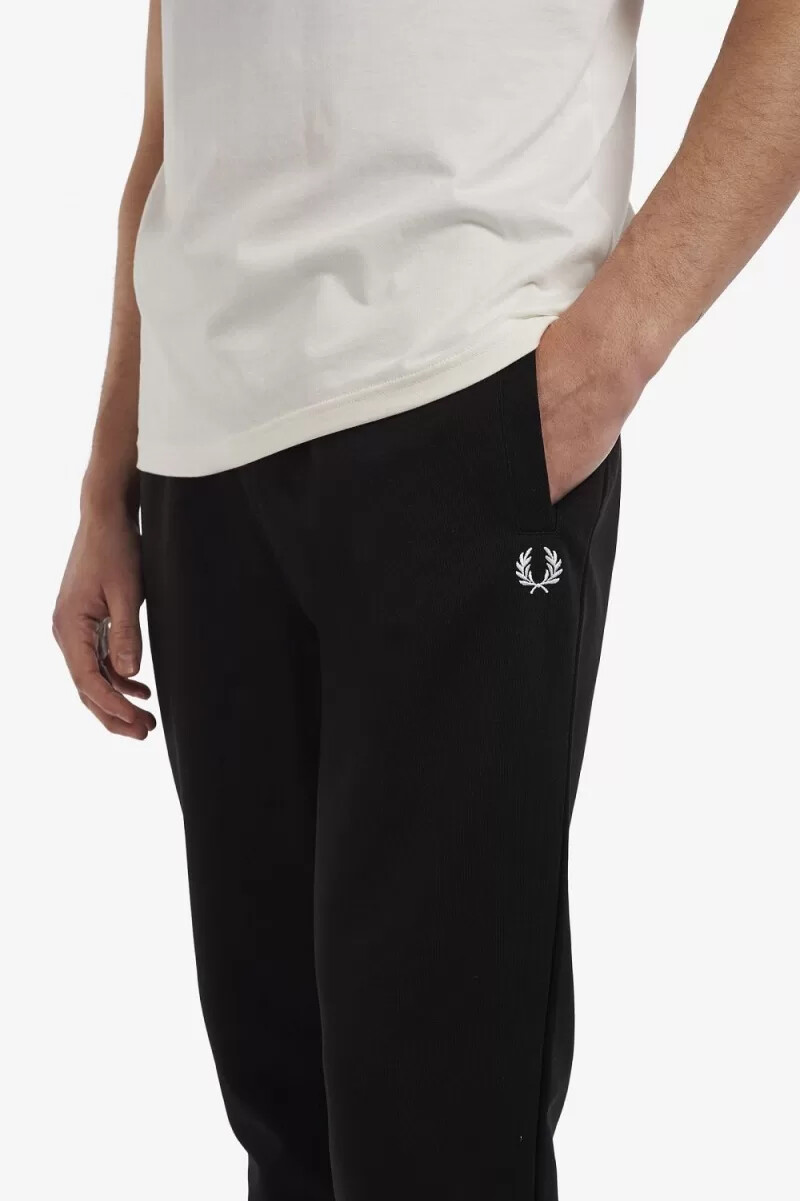 fred perry reverse tricot trainingshose für herren schwarz