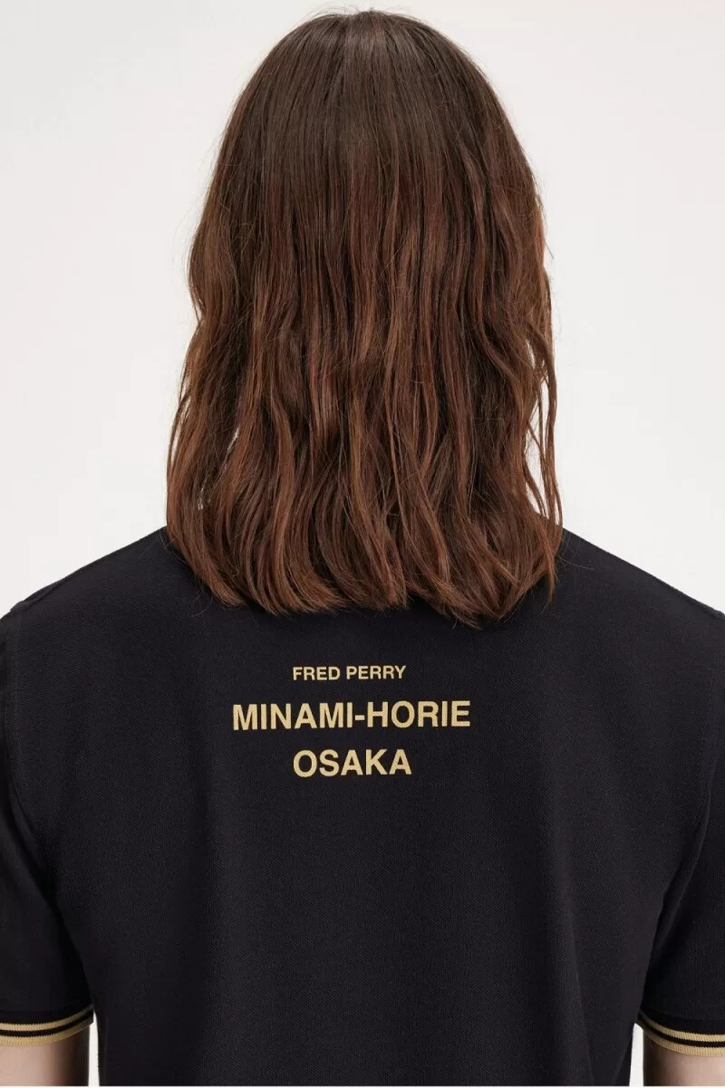 fred perry osaka m12 herren-poloshirt schwarz champagner