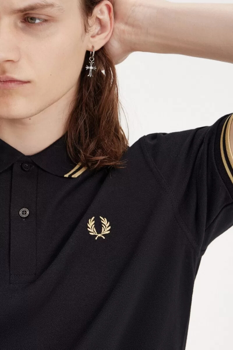 fred perry osaka m12 herren-poloshirt schwarz champagner