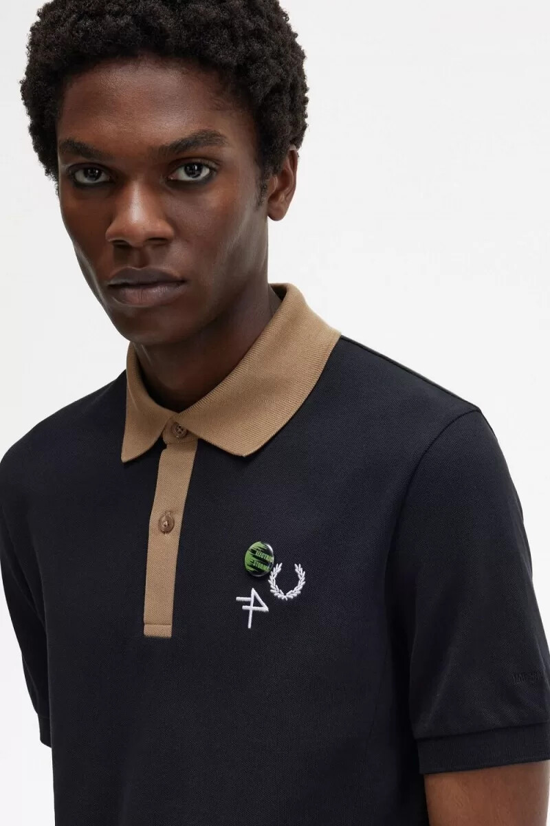 fred perry poloshirt für herren mit kontrastkragen schwarz